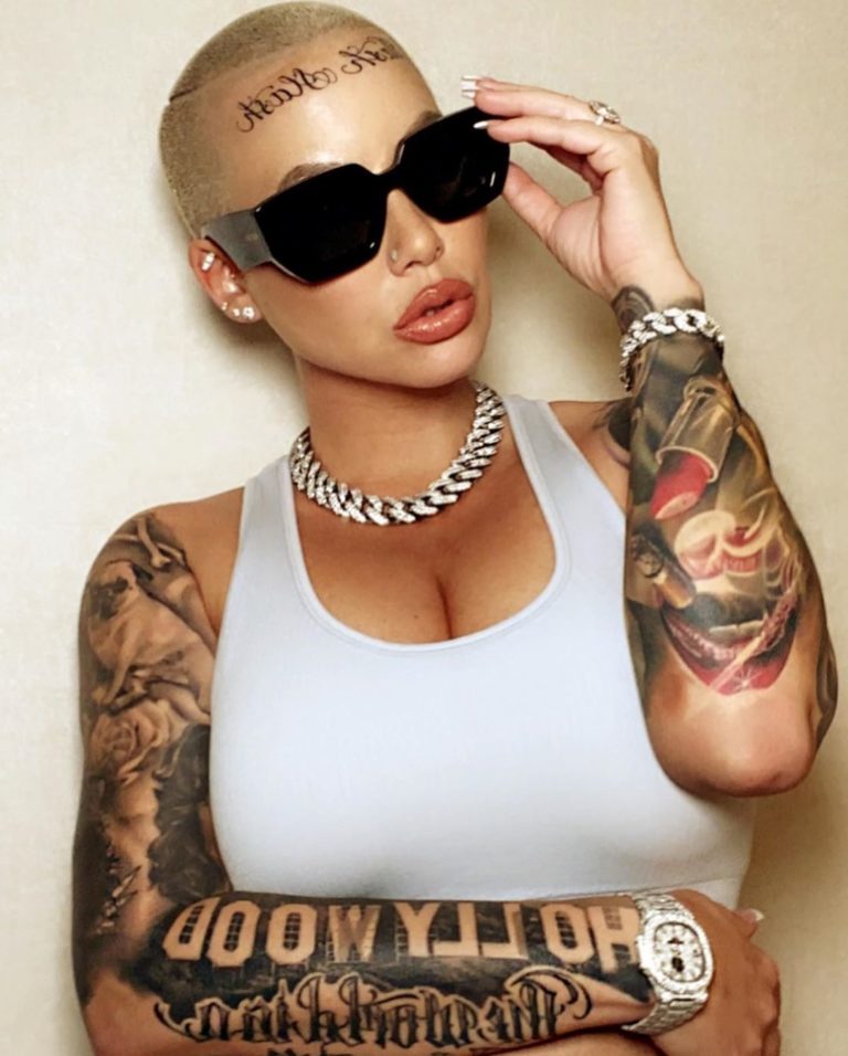 After Liposuction Amber Rose Gets A Forehead Tattoo Demotix 