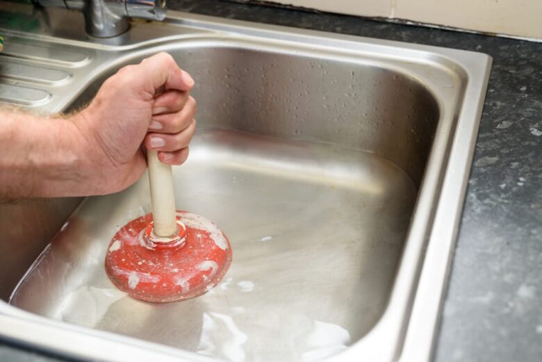 causes of clogged kitchen sink